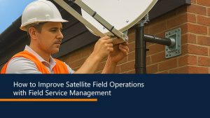 Technician installing equipment on site – satellite field operations